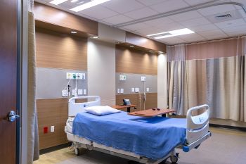 Patient room showing a swing bed